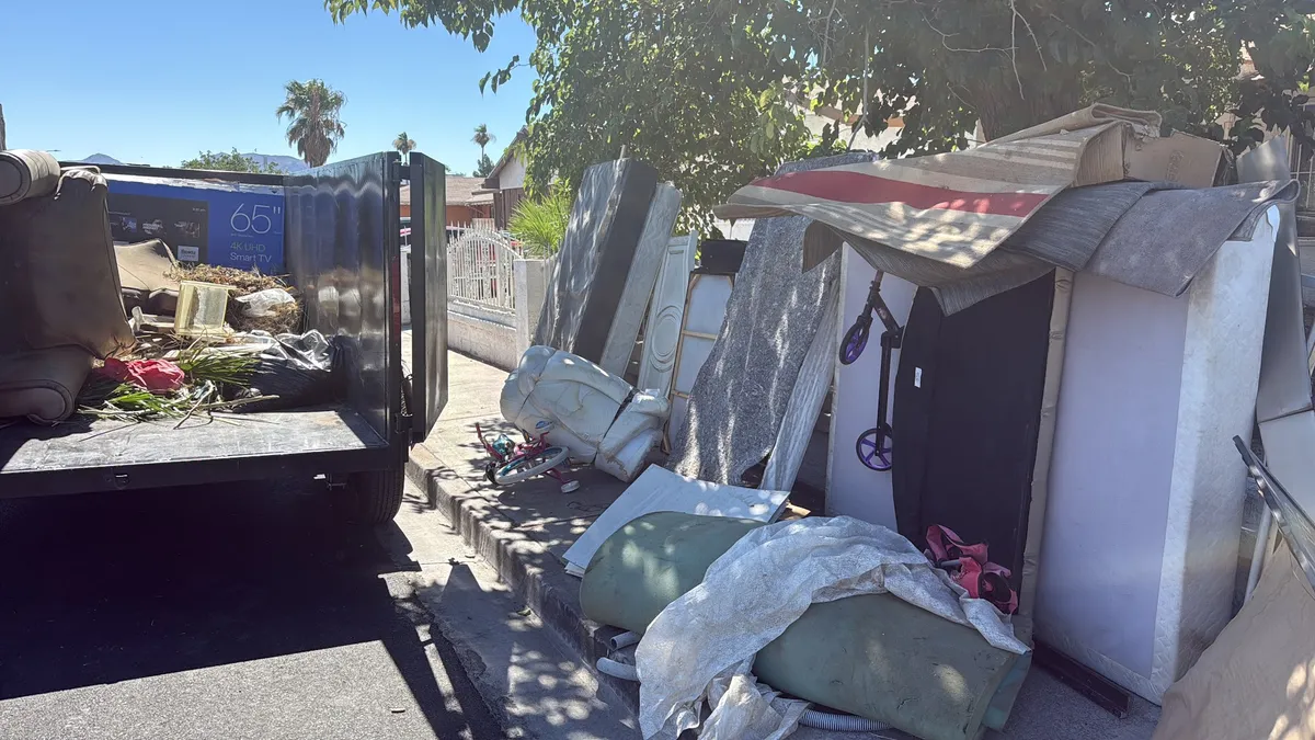 Furniture and mattresses removed during a property cleanout