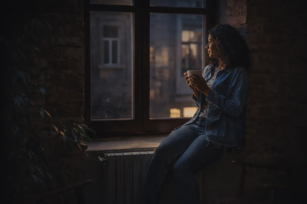 baby lying on blue textile