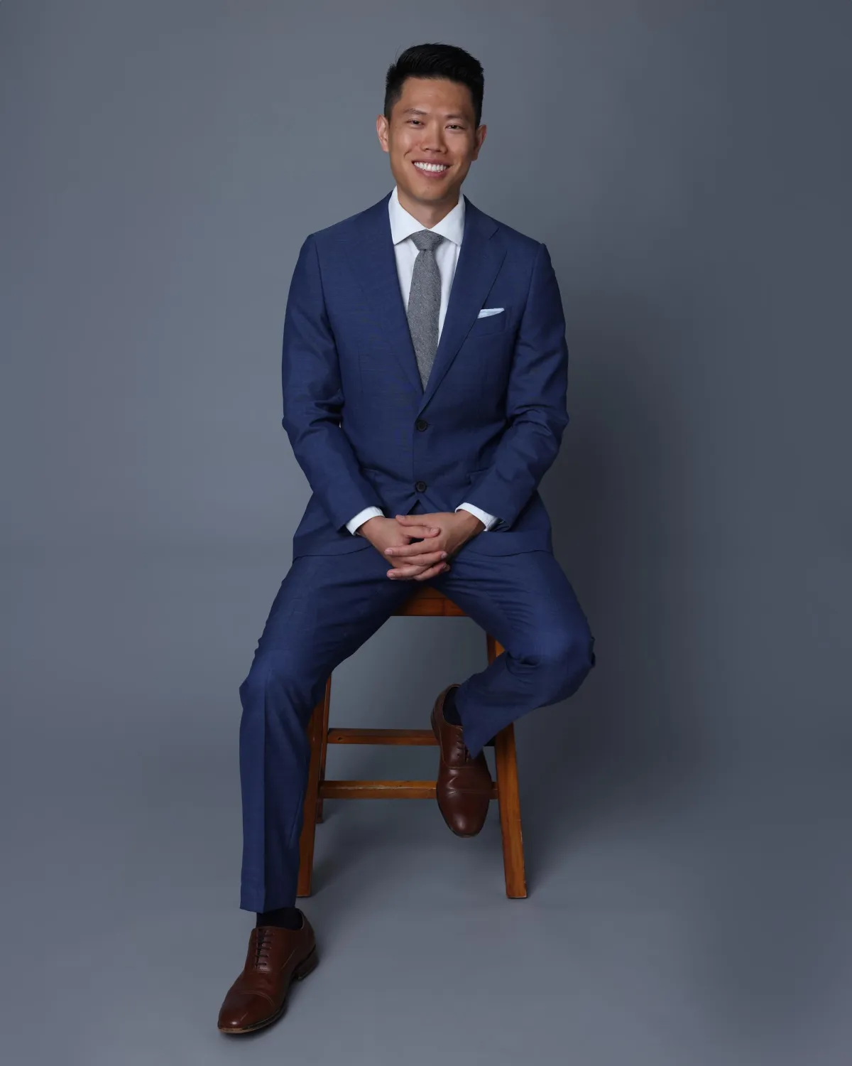 Man wearing suit  in photo studio Oahu. 