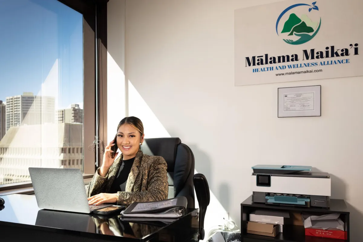 Malama Maikai staff in office. 