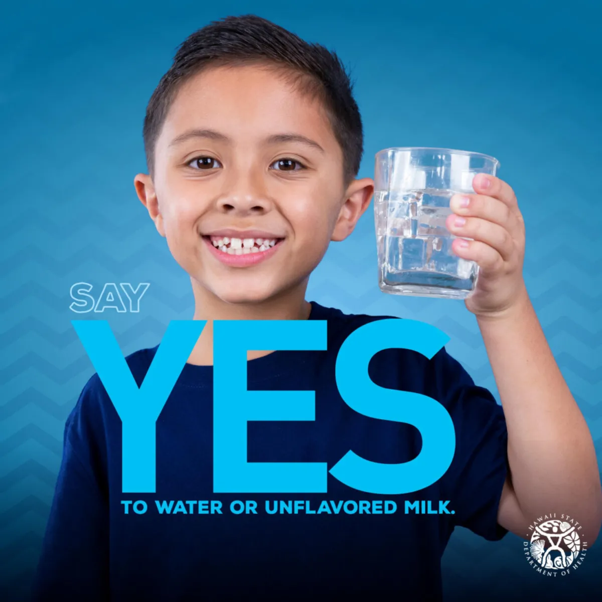 Child holding glass cup.
