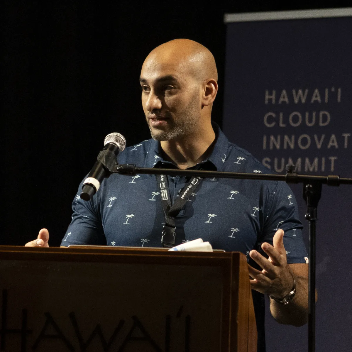 Man speaking at podium 