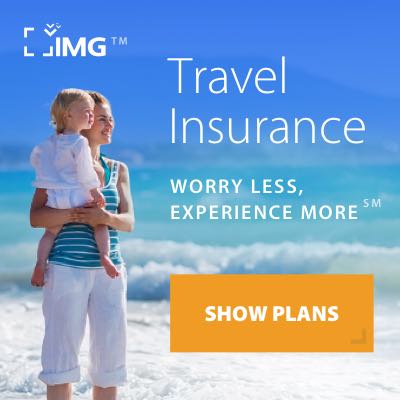 Traveler reviewing travel insurance coverage on a laptop