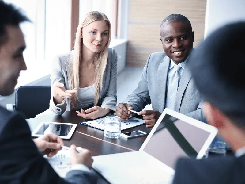 Close-up of financial reports showing bar and pie charts, symbolizing cash flow reporting and job-level profitability insights for restoration contractors