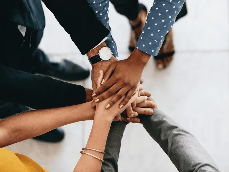 Close-up of a hand pointing at a route map and data on a tablet, symbolizing administrative support and crew route optimization for efficiency