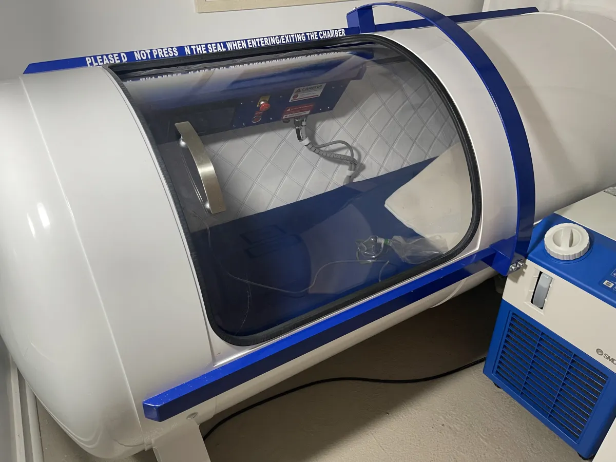 Workers loading scrap metal onto a truck