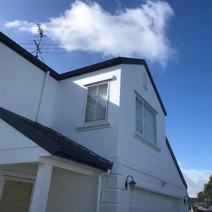 Building exterior after plastering and rendering work