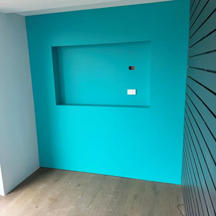 Commercial lobby undergoing plastering and finishing