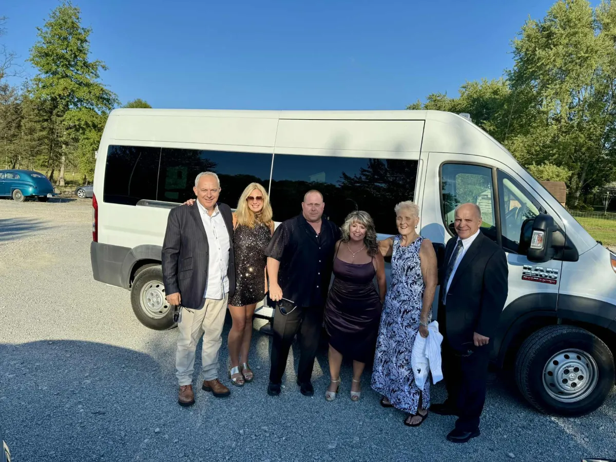 white van parked beside building