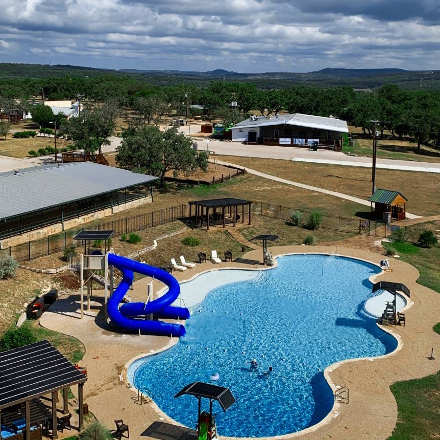 Aerial view of the venue with a waterslide and pool