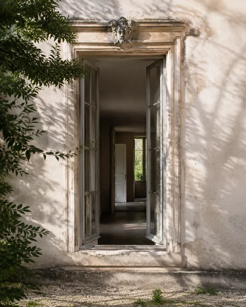 Timeworn Manor Window in Aged Plaster