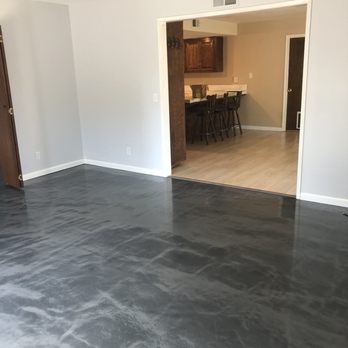 Technician cleaning upholstery fabric in a Santa Maria residence — services for homeowners and commercial/office clients in Santa Barbara and San Luis Obispo counties.