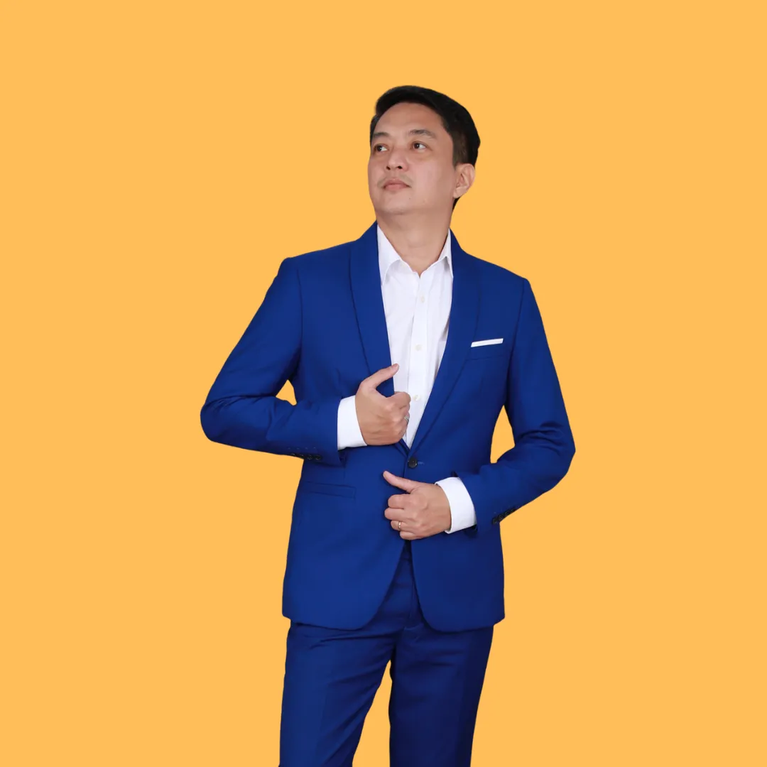 Portrait photo of Jordan Hale, founder and lead coach, three-quarter view with soft studio lighting, confident smile, navy blazer, neutral background.