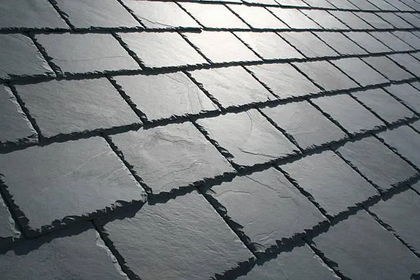 Close-up of slate roof tiles demonstrating the natural beauty and quality craftsmanship.