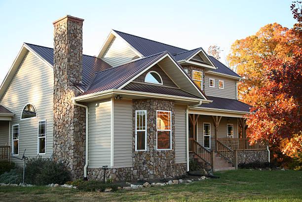 Elegant standing seam metal roof enhancing the architectural beauty of a residential home, offering both style and durability