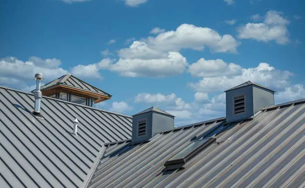 Durable metal roofing on a house, designed for longevity and resistance to extreme weather conditions