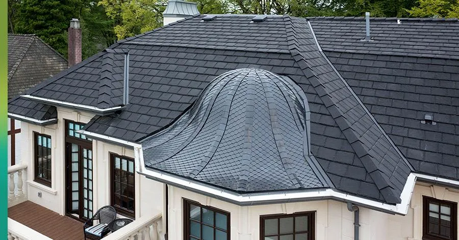 Elegant home with a curved rubber roof installation, exemplifying the versatility and protective qualities of EPDM roofing by Home Star Roofing.