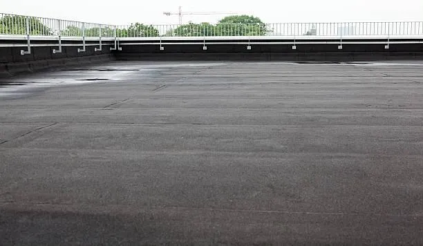 Empty commercial flat roof awaiting replacement, showcasing the pre-replacement condition as part of Home Star Roofing's services.