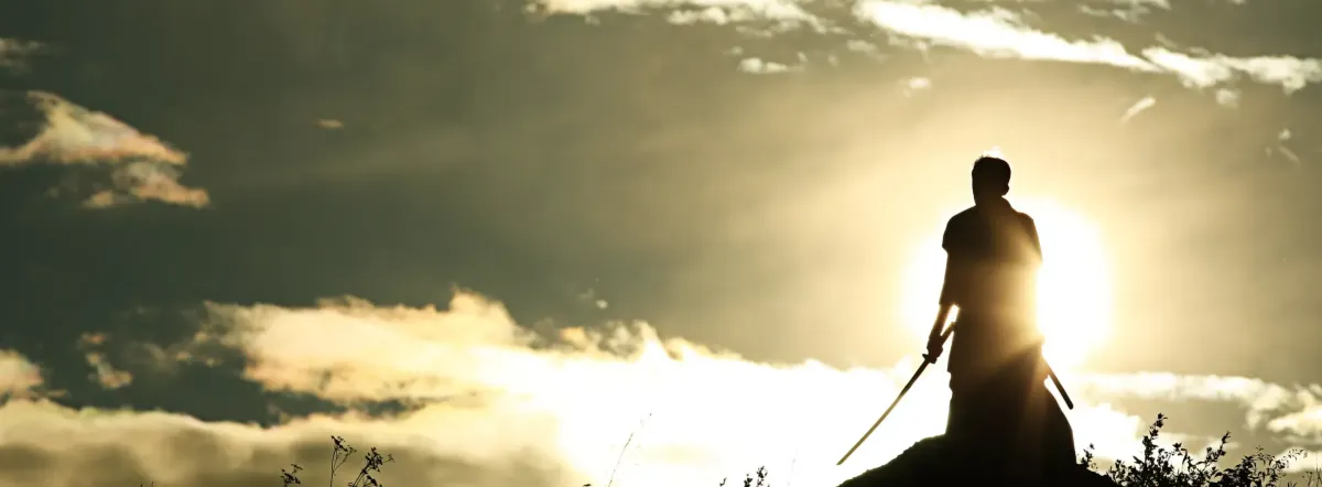 woman signing on white printer paper beside woman about to touch the documents
