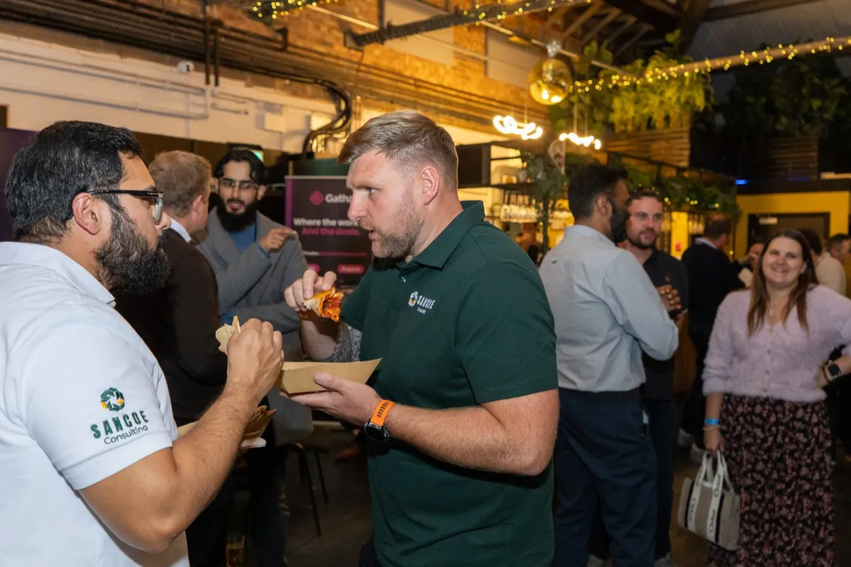 Exhibitors and guests talking on the floor at UK Homes Network LIVE Leeds, September 2026