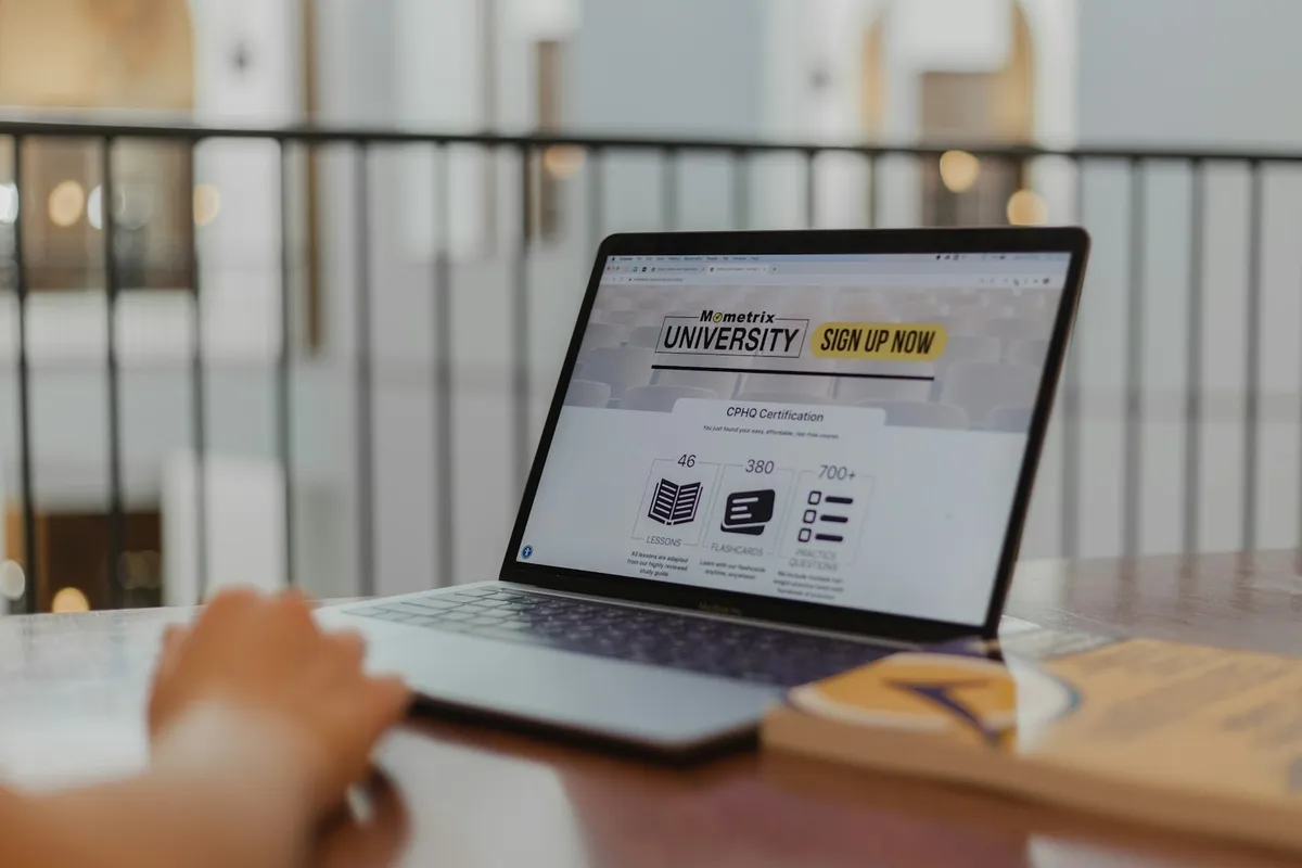 Laptop on a desk showing a local business website