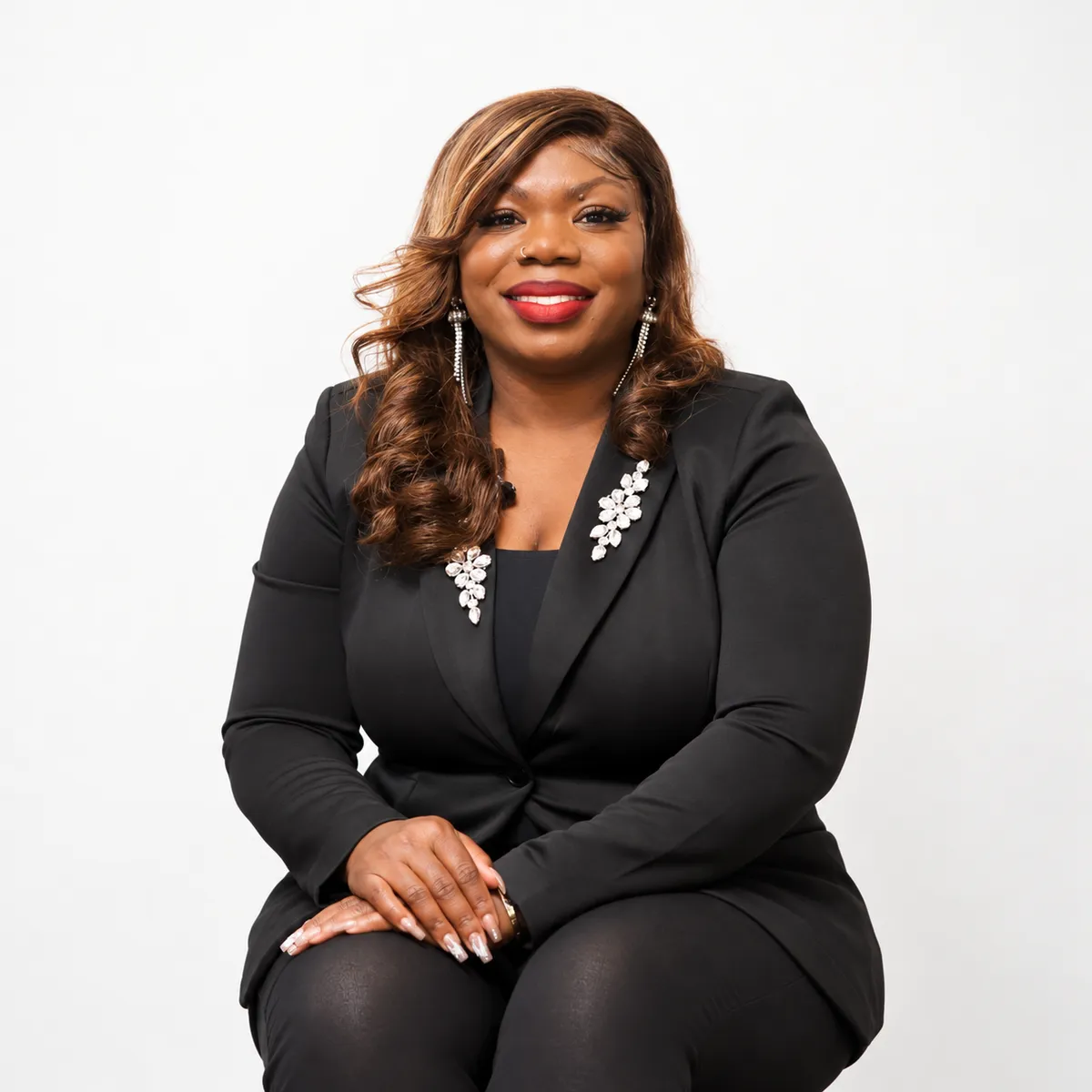 Janelle Dennis, Carter Capital tax expert, wearing a black suit