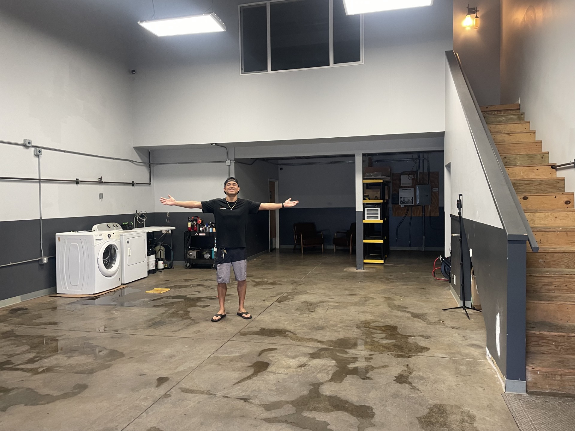 Justin Fetalvero inside Island Elite Detail’s Kihei studio during its early buildout