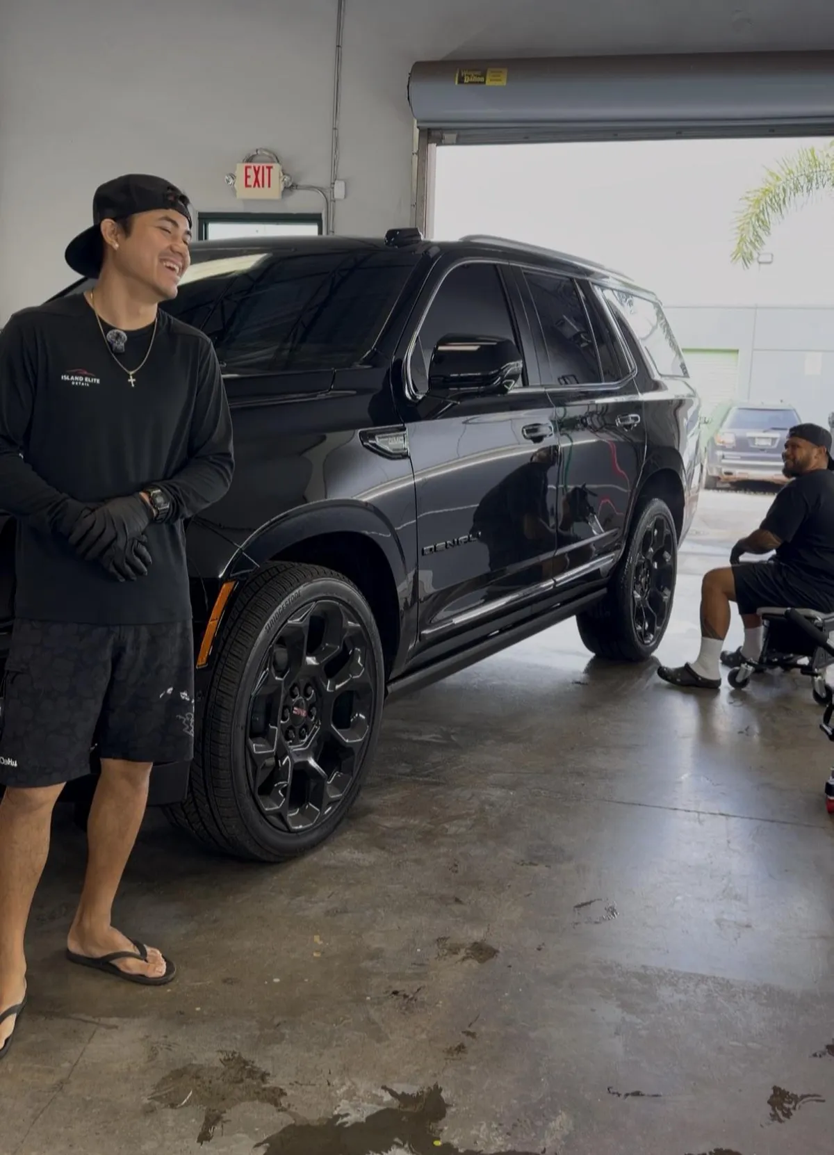 Justin Fetalvero and Brent working together at Island Elite Detail’s Kihei studio
