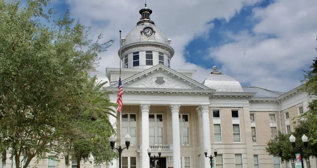 Historic Polk County Courthouse with white dome and columns in Bartow, Florida