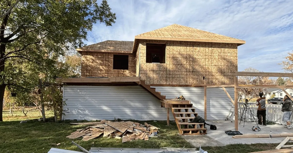 Homeowners reviewing renovation plans and asking key questions before starting a full home remodel in the Salt Lake City area.