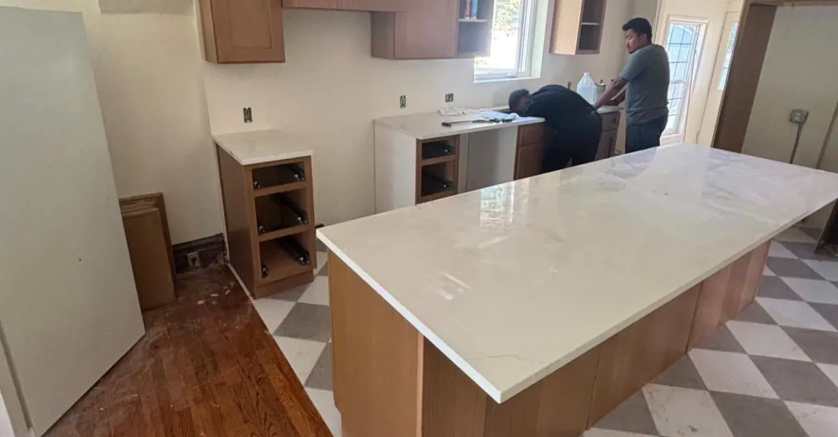 Homeowner meeting with a full home remodeling contractor in the Salt Lake City area to discuss renovation plans.