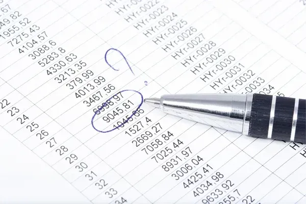Experienced bookkeeper reconciling accounts in Washington