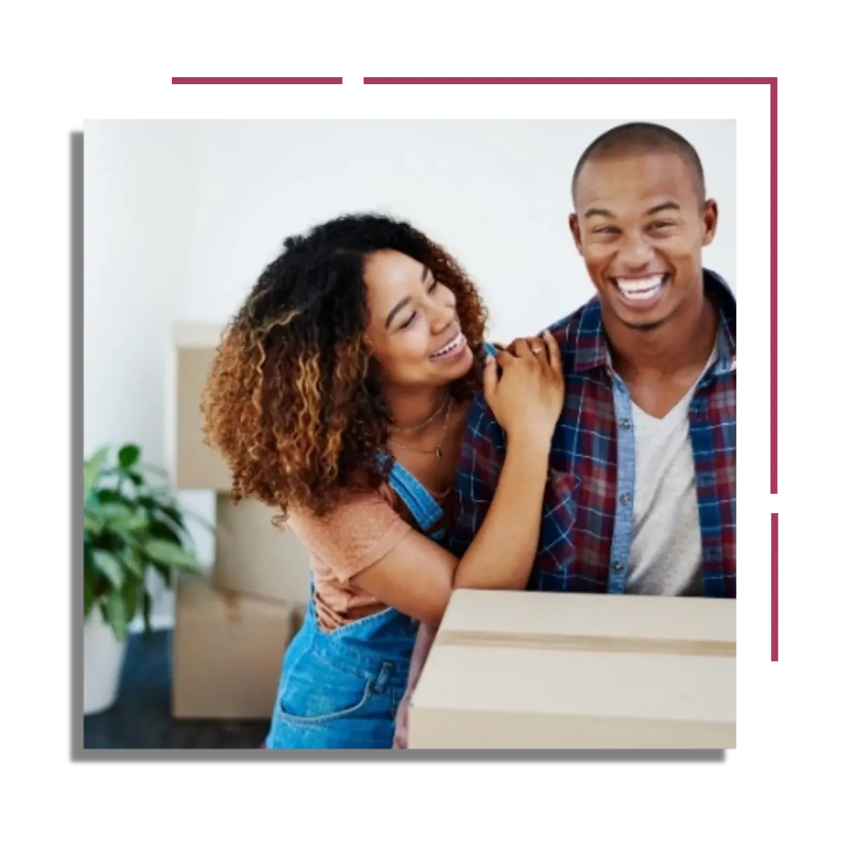 happy couple with moving boxes