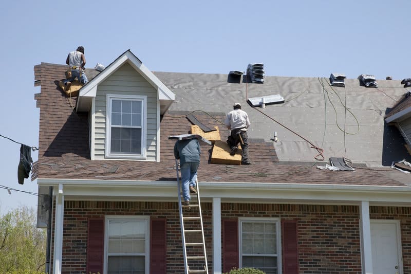 a roof with a few shingles