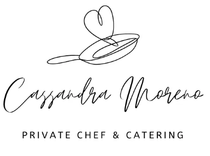 Two women exchanging business cards and laughing, highlighting real connection and networking outcomes.