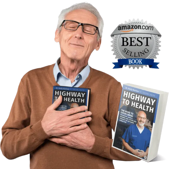 Older man holding  dr. Andy Barlow's  book  Highway to health