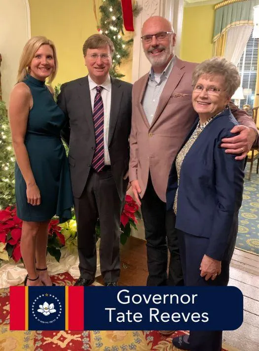 Dr. Andy Barlow Chiropractor standing with Mississippi Governor Tate Reeves