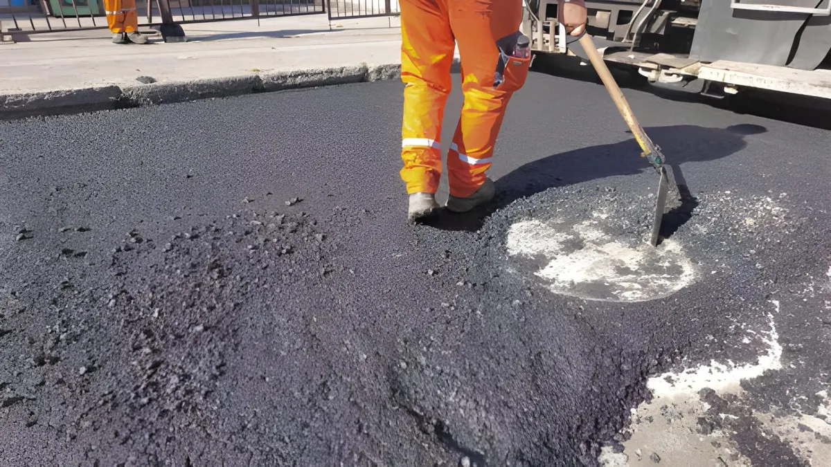 Concrete driveway company near me finishing smooth driveway surface