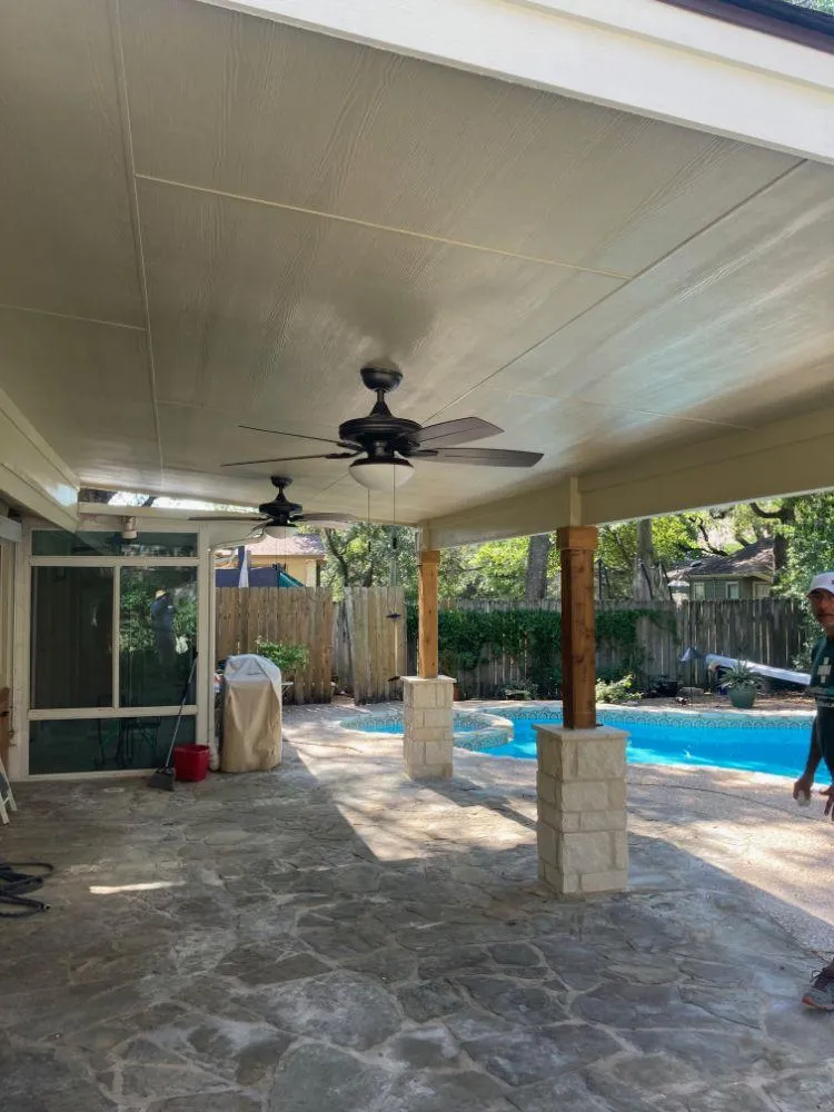 a man with a driller and a hat on