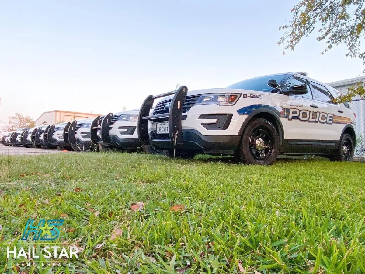 Technician greeting a customer at a ForgeFix Auto front desk