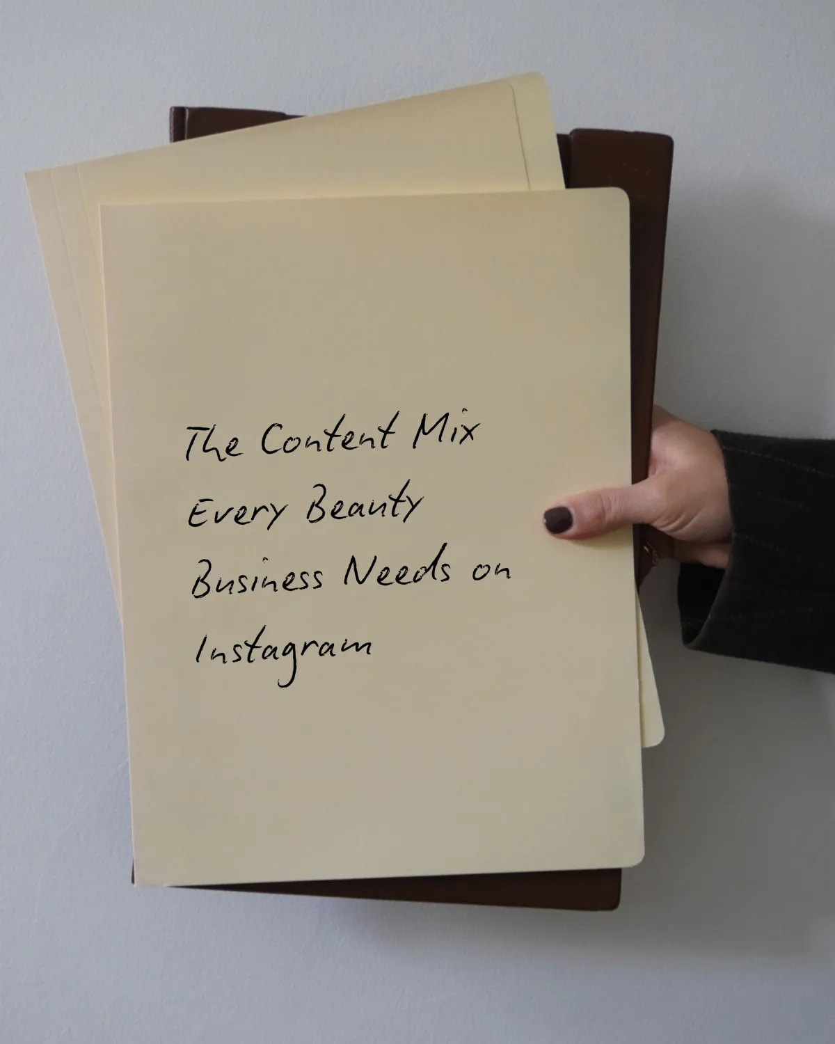 folder with writing: the content mix every beauty business needs