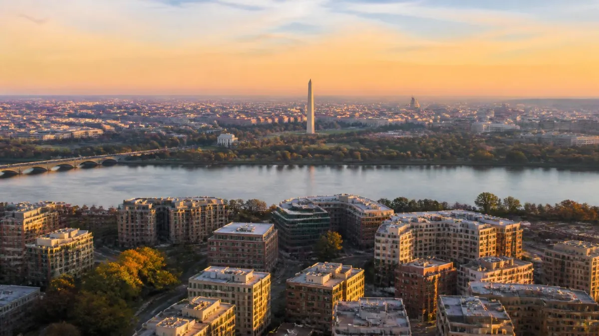 Aerial view of Arlington VA with DC skyline at sunrise