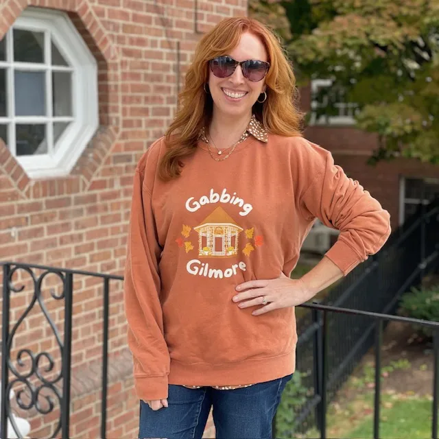 jackie in a gilmore girls sweatshirt