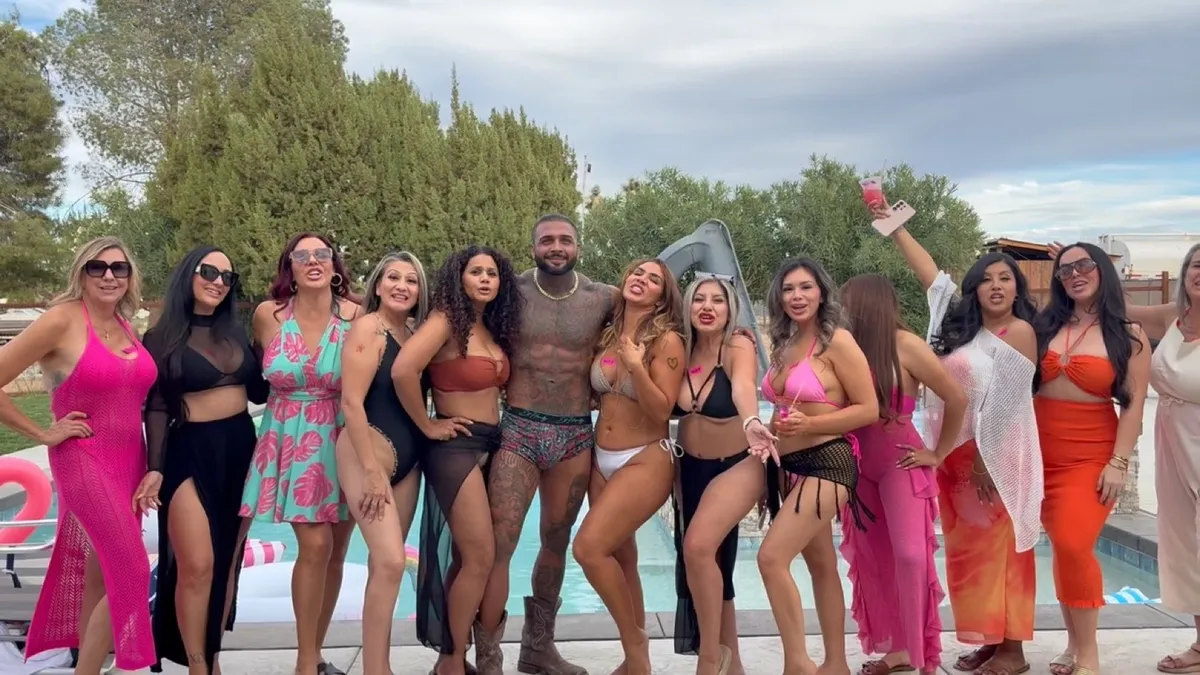 Friends celebrating at a divorce party with drinks and a Cheeky Butler