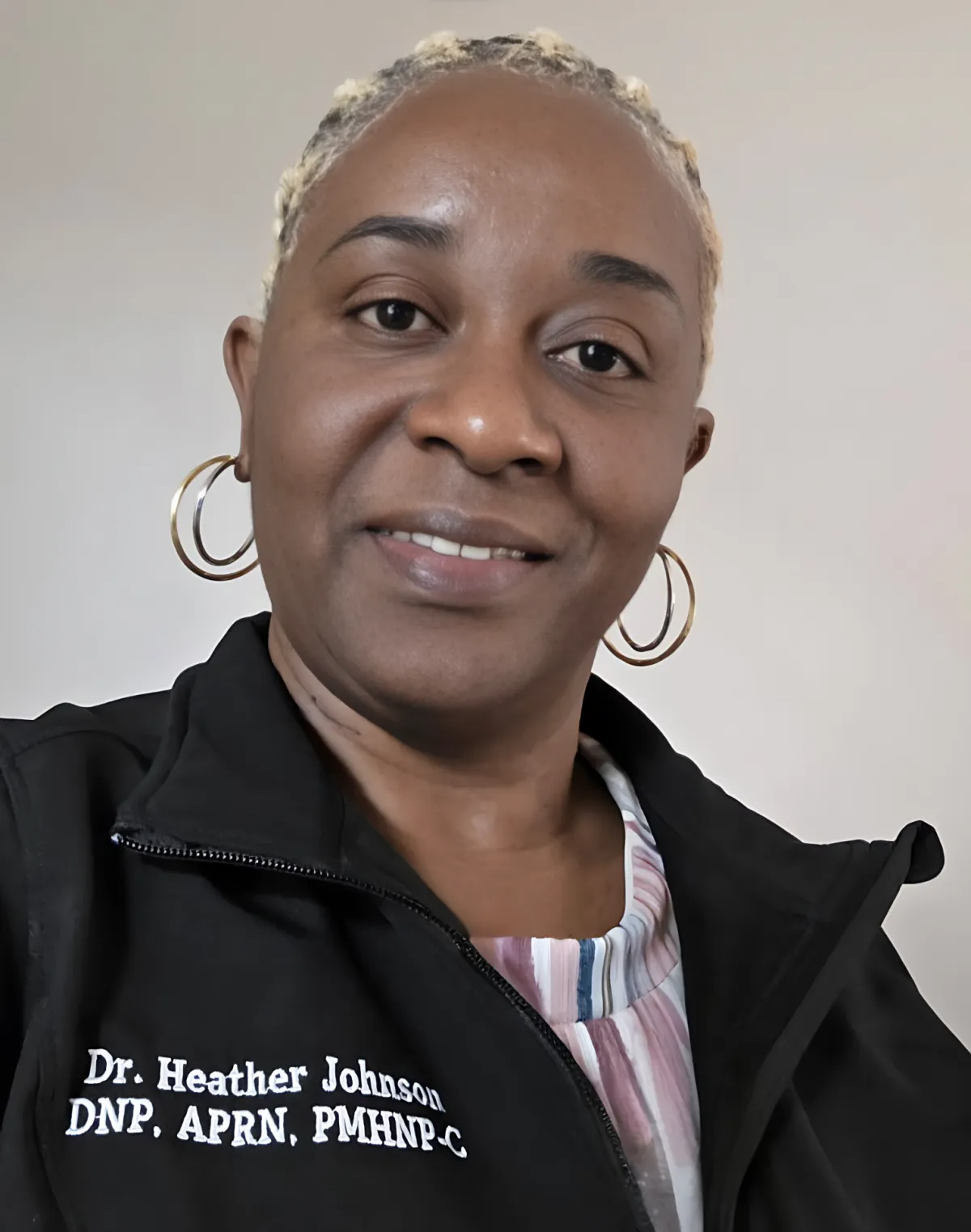 Dr. Johnson in a warm, natural-light setting