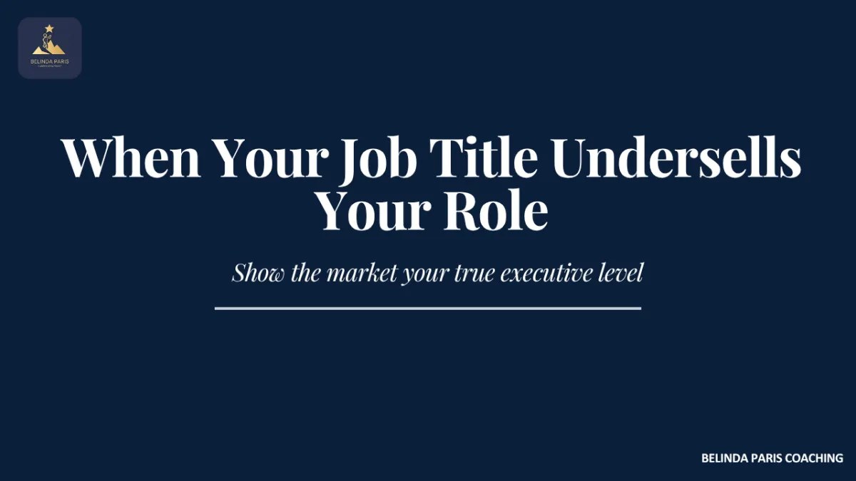Senior executive reviewing a resume where the job title understates the scope of the role