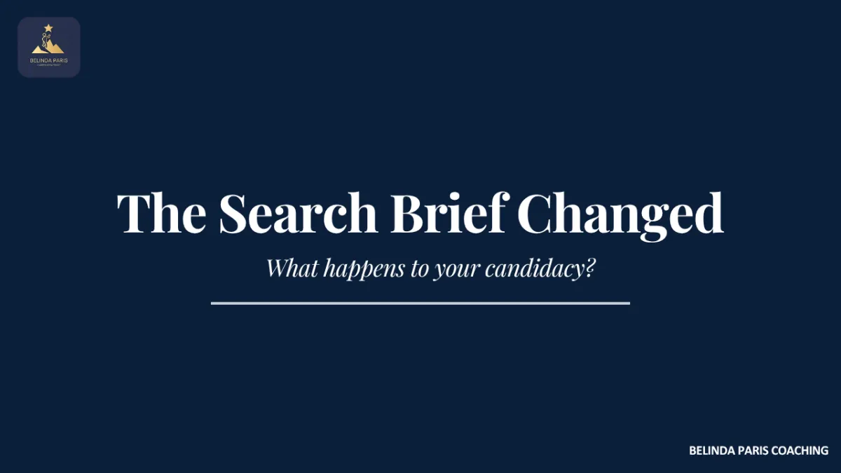 Senior executive reviewing a revised leadership role brief during a search process