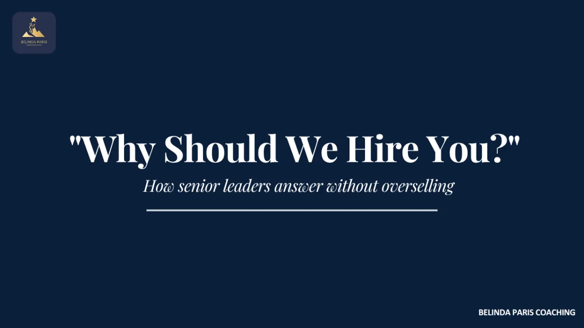 Senior executive answering a question from an interview panel