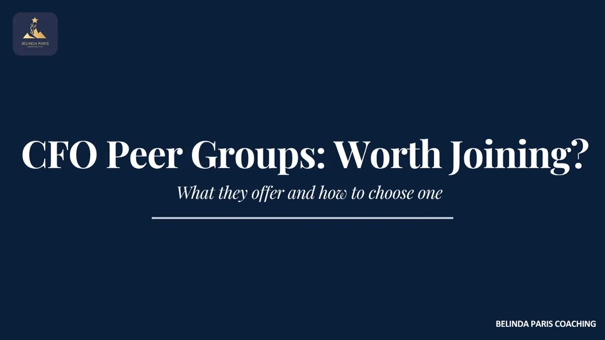 Small group of CFOs talking around a meeting table at a peer forum