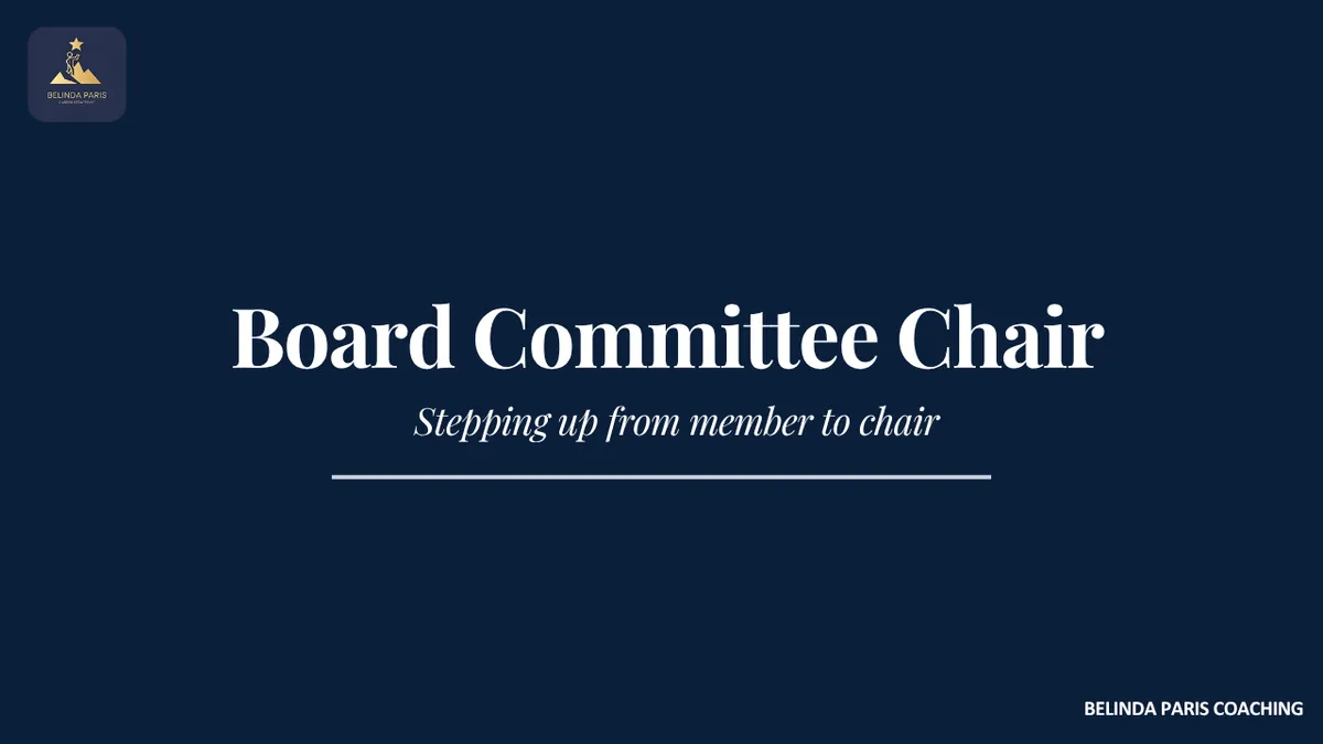 Non-executive director chairing an audit and risk committee meeting with management at the table